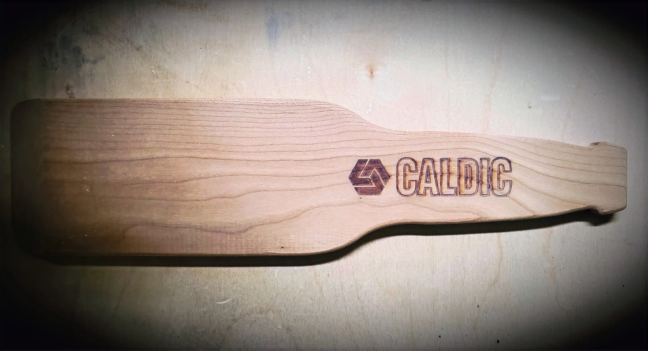 Custom logo engraved on wood
